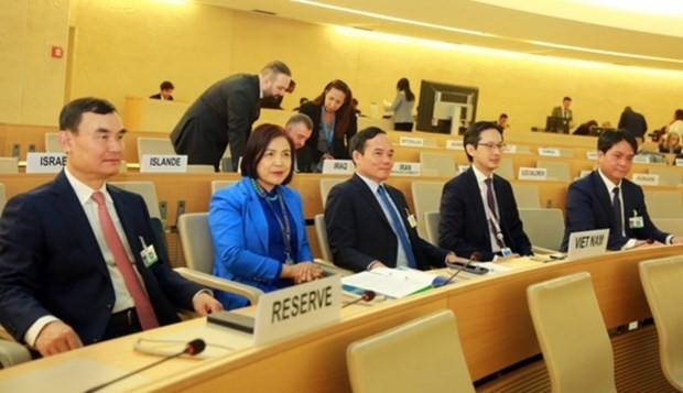 Deputy PM Tran Luu Quang (centre) and other Vietnamese officials before the opening of the UNHRC's 52nd regular session on February 27 (Photo: baochinhphu.vn)