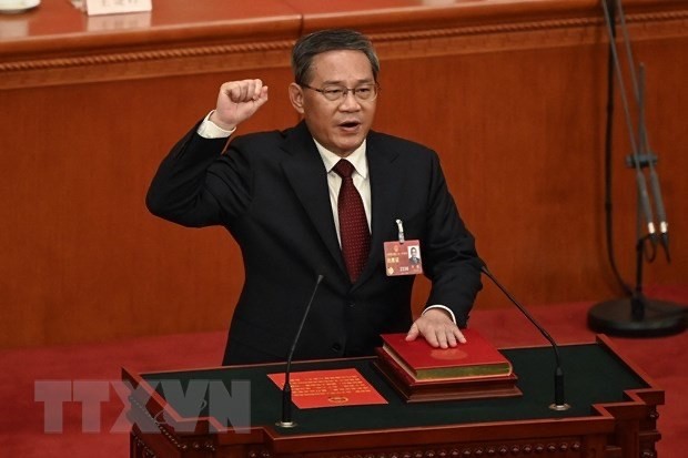 China's newly-elected Premier Li Qiang takes the oath at the first session of the National People's Congress (NPC) in Beijing, China on March 11 (Photo: AFP/VNA)