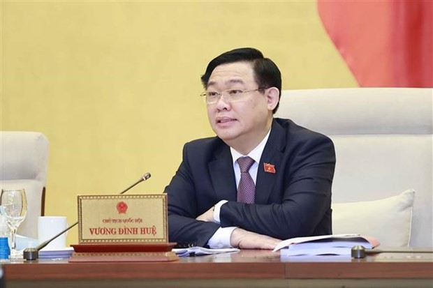 NA Chairman Vuong Dinh Hue speaks at the discussion of the NA Standing Committee on March 15. (Photo: VNA)