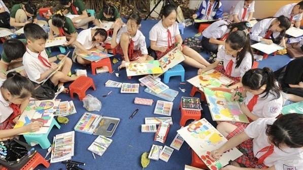 A painting contest for children was held during the event. (Photo: VNA)