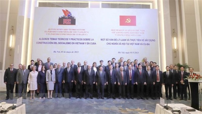 Delegates attend the fifth Theoretical Symposium between the Communist Party of Vietnam and the Communist Party of Cuba. (Photo: VNA)