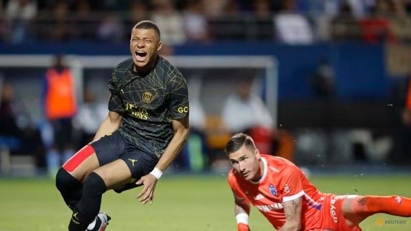 Paris St Germain’s Kylian Mbappe reacts after a challenge from Troyes’ Gauthier Gallon. (Photo: Reuters)