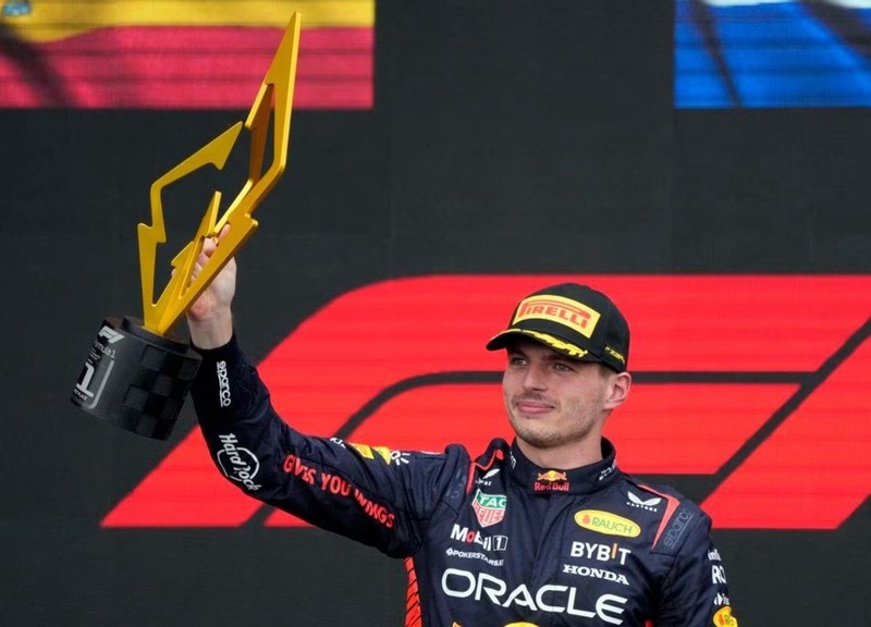 Red Bull's Max Verstappen celebrates with a trophy on the podium after winning the race -Formula One F1 - Canadian Grand Prix - Circuit Gilles Villeneuve, Montreal, Canada - June 18, 2023. (Photo: Reuters)