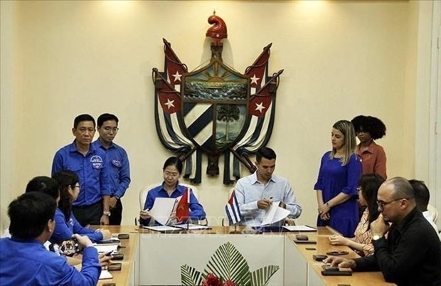 At the signing ceremony of the MoU. (Photo: VNA)