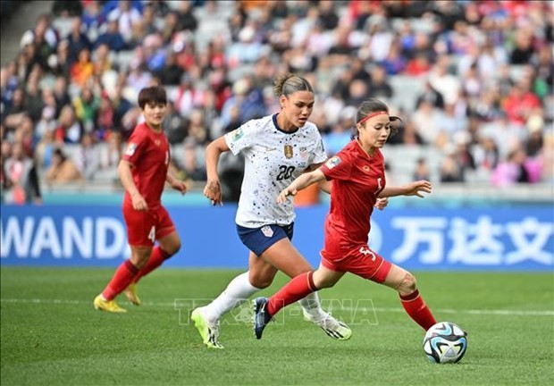 Vietnamese footballers (red) in their first match against US rivals at the FIFA Women’s World Cup 2023. (Photo: VNA)