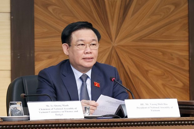 NA Chairman Vuong Dinh Hue speaks at the forum. (Photo: VNA)