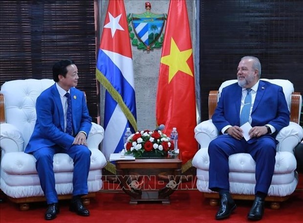 Deputy Prime Minister Tran Hong Ha (left) and Cuban Prime Minister Manuel Marrero Cruz. (Photo: VNA)