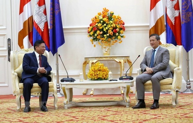 Cambodian Prime Minister Samdech Thipadei Hun Manet receives Vietnamese Ambassador Nguyen Huy Tang in Phnom Penh on October 11. (Photo: VNA)