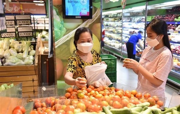 At a supermarket in Ho Chi Minh City (Photo: VNA)