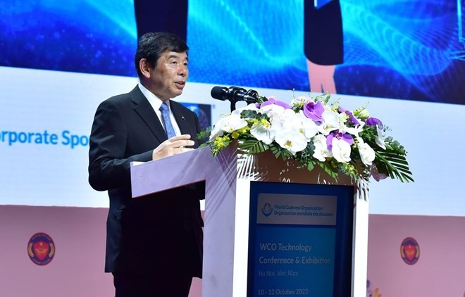 World Customs Organisation Secretary-General Kunio Mikuriya speaks at the opening of Technology Conference and Exhibition of the World Customs Organisation 2023 which is underway in Hanoi. (Photo: VietnamPlus)
