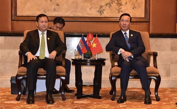 President Vo Van Thuong (R) receives Cambodian Prime Minister Hun Manet in Beijing, China, on October 18. (Photo: VNA)