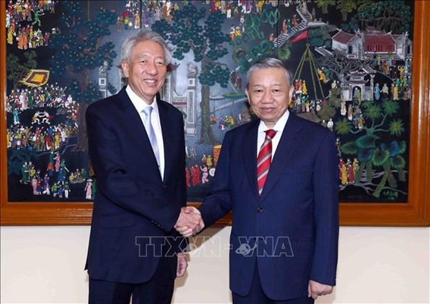 Minister of Public Security To Lam (R) and Minister for National Security of Singapore Teo Chee Hean (Photo: VNA)