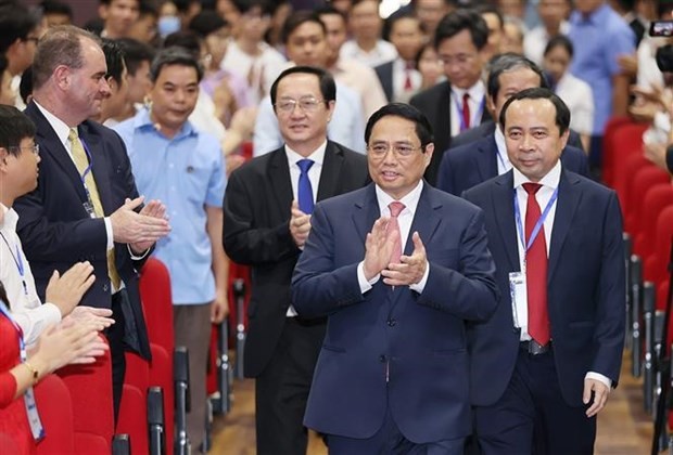 Prime Minister Pham Minh Chinh attends a ceremony to launch the new academic year at the Vietnam National University-Ho Chi Minh City (VNU-HCM) on November 16. (Photo: VNA)