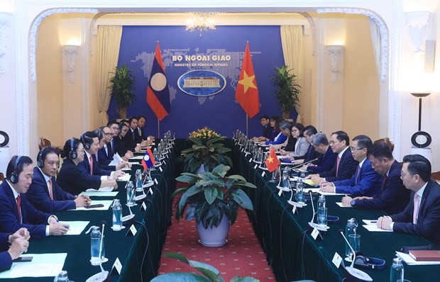 At the tenth Vietnam-Laos foreign ministerial-level consultation meeting. (Photo: VNA)