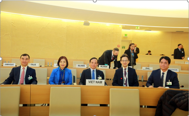 Deputy Prime Minister Tran Luu Quang (centre) and a Vietnamese delegation attending the UNHRC's 52nd session (Photo: VNA)