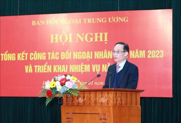 Le Hoai Trung, Secretary of the Party Central Committee and head of its Commission for External Relations, speaks at the conference. (Photo: VNA)