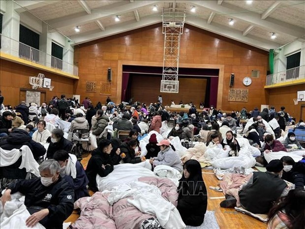 At the sports hall of a school in Wakura Onsen city, Ishikawa, where Vietnamese workers seek shelter after the earthquake. (Photo: VNA)