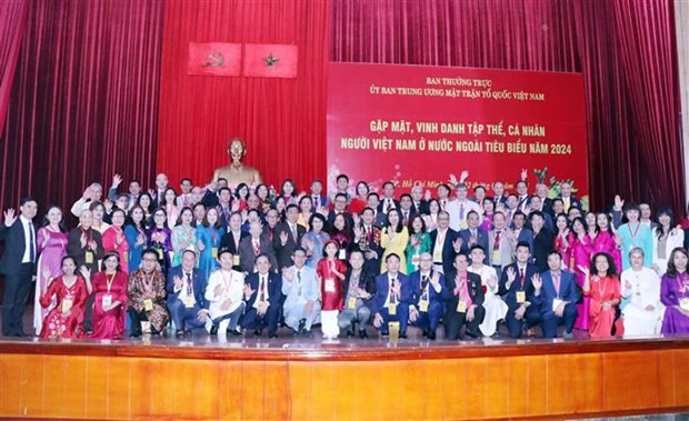 Participants pose for a photo at the event (Photo: VNA)