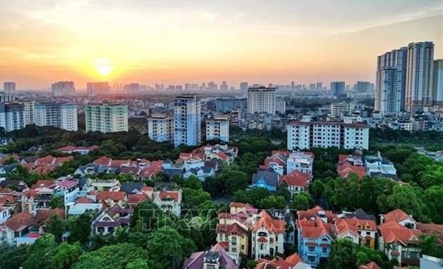 In 2024, Vietnam's GDP growth rate is expected to reach 6-6.5%, thanks to stable foreign direct investment (FDI) and the Government’s efforts to address real estate challenges, increase public investment, and implement growth stimulation policies in a timely manner. (Photo: VNA)