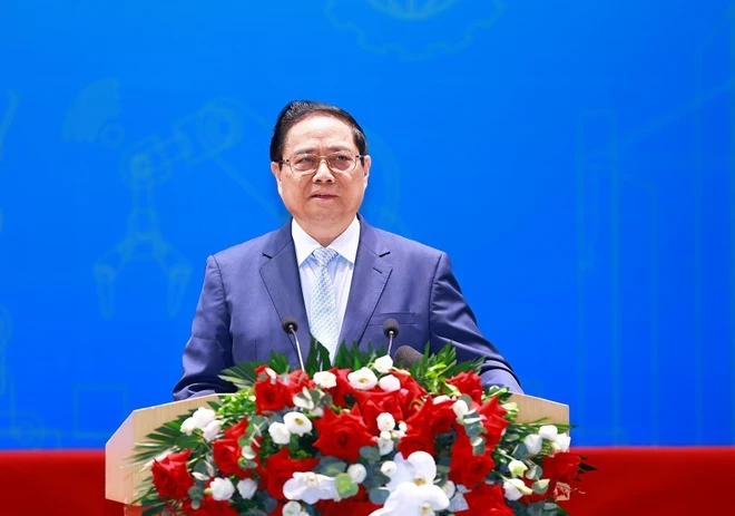 PM Pham minh Chinh speaks at the national forum on labour productivity held by the Vietnam General Confederation of Labour. (Photo: VNA)
