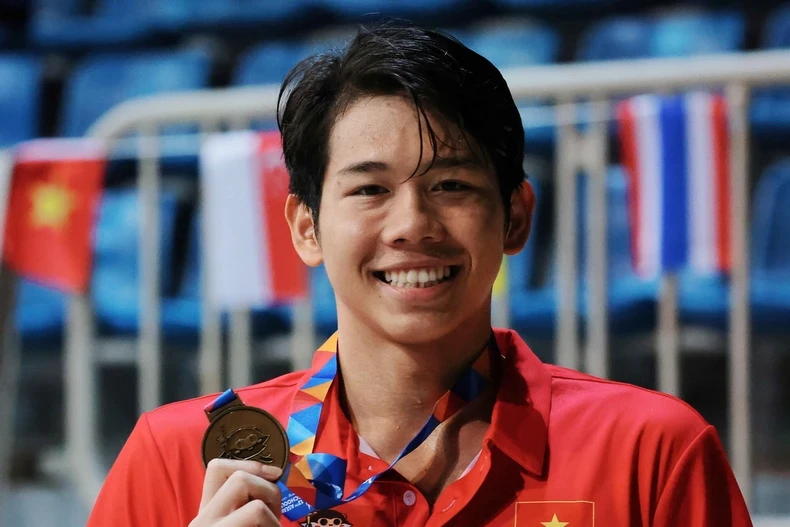 Nguyen Quang Thuan wins double golds on June 6 in the men's 200m butterfly and 1,500m freestyle events.