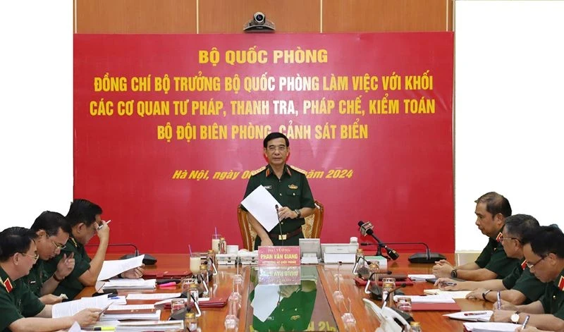 General Phan Van Giang speaks at the meeting.