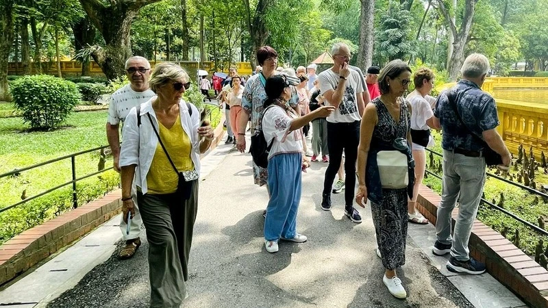 Foreign tourists at President Ho Chi Minh's Vestige in Presidential Palace Area (Photo: NDO)