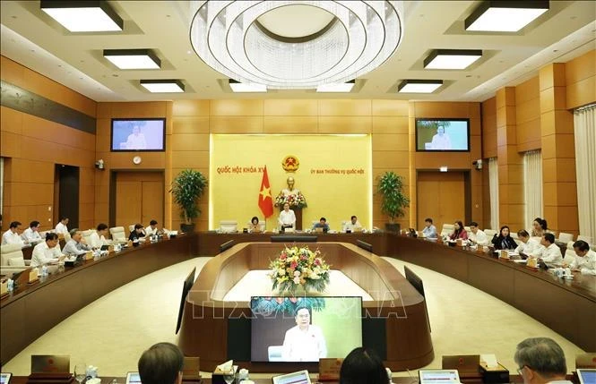 At the 5th thematic session on law building of the National Assembly (NA) Standing Committee on August 12 morning. (Photo: VNA)