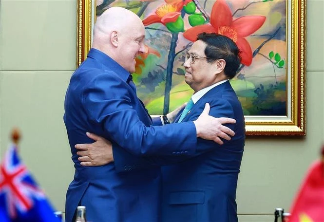 Vietnamese Prime Minister Pham Minh Chinh (right) and his New Zealand counterpart Christopher Luxon. (Photo: VNA)