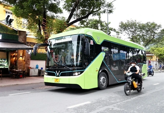 An electric bus in HCM City. By 2030, the Ministry of Transport wants 623 Compressed Natural Gas on the roads of Hanoi and HCM City. (Photo: VNA)