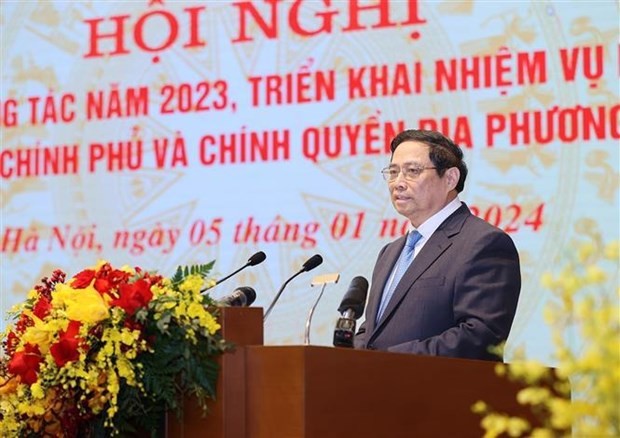 PM Pham Minh Chinh addresses the national teleconference between the Government and local administrations on January 5. (Photo: VNA) 