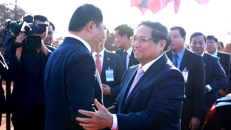 Prime Minister Pham Minh Chinh and his Lao counterpart Sonexay Siphandone attend the groundbreaking ceremony of the Laos-Vietnam Friendship Park project. (Photo: Duong Giang/VNA)