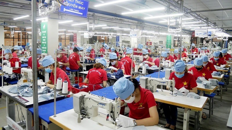 Garment production for export at May 10 Corporation. (Photo: QUYNH CHI)