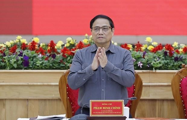 Prime Minister Pham Minh Chinh speaks at the meeting. (Photo: VNA)
