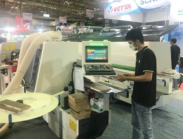 A booth at the 2022 Vietnam International Woodworking Industry Fair. This year's expo will be held in Ho Chi Minh from September 20 to 23. (Photo: VNA)