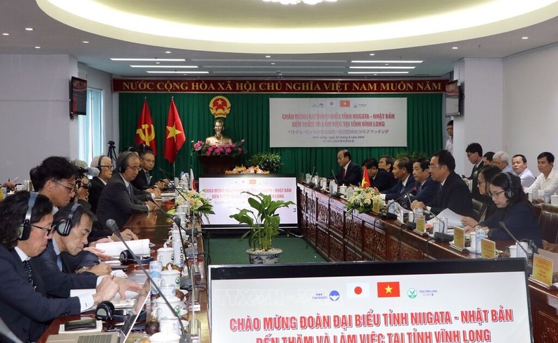 Representatives from Vinh Long province and Japan's Niigata pefecture at the meeting on August 5. (Photo: VNA)