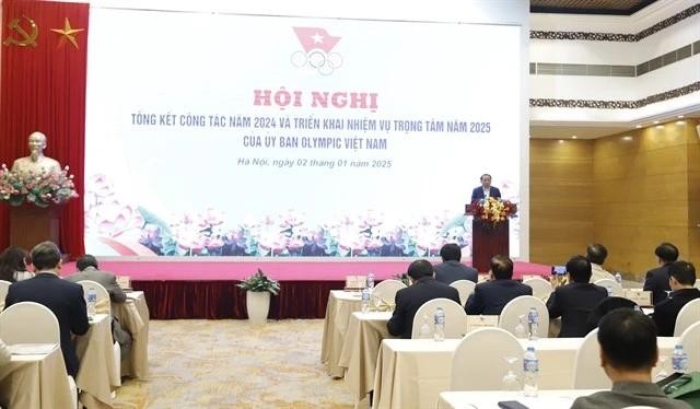 Minister of Culture, Sports and Tourism cum VOC President Nguyen Van Hung speaks at the conference on Vietnam's sport plans in 2025 on January 2 in Hanoi. (Photo: VNA)