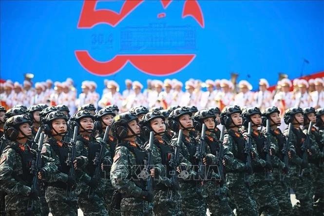 Female special police officers at the parade marking the the 50th anniversary of the Liberation of the South and National Reunification on April 30. (Photo: VNA)