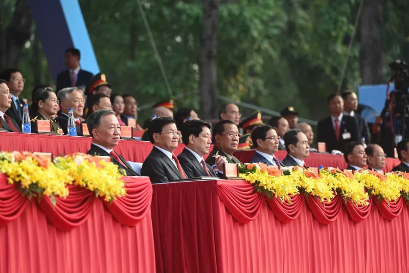 Leaders of the Party and State alongside international guests on the grandstand at the ceremony. (Photo: VNA)