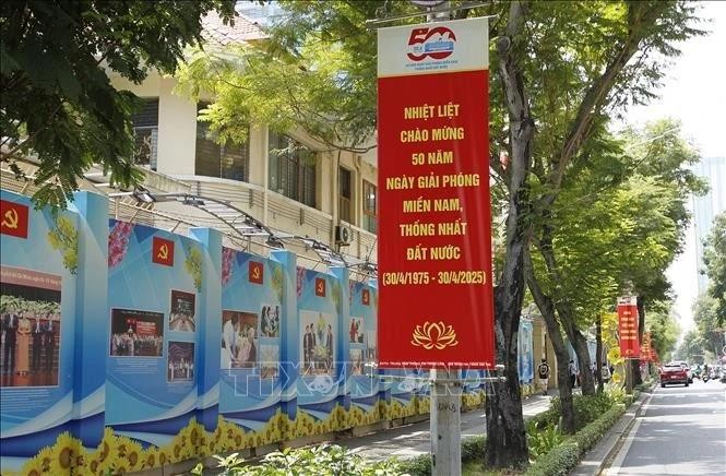 Panels and banners celebrate the 50th anniversary of national reunification in HCM City (Photo: VNA)