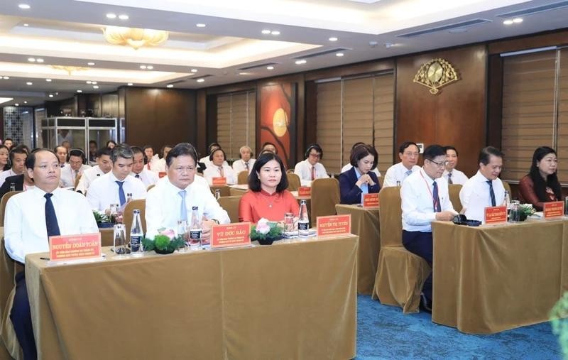 Delegates attend the opening ceremony of the course. (Photo: NDO)