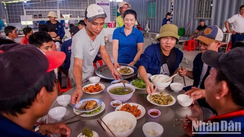 The workers' enthusiasm is fuelled by delicious meals provided by devoted construction cooks.