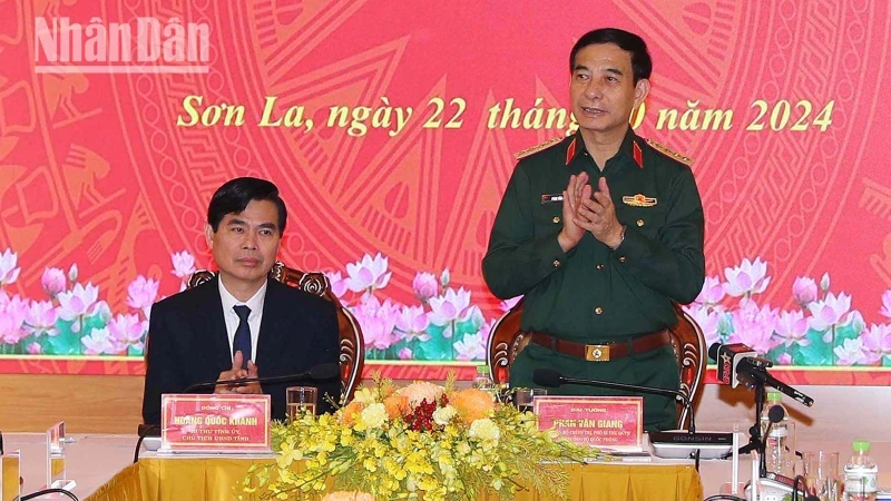 General Phan Van Giang, Politburo member, Deputy Secretary of the Central Military Commission, and Minister of National Defence speaks at the working session.