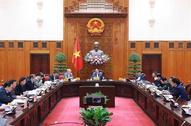 PM Pham Minh Chinh speaks at the meeting. (Photo: VNA)