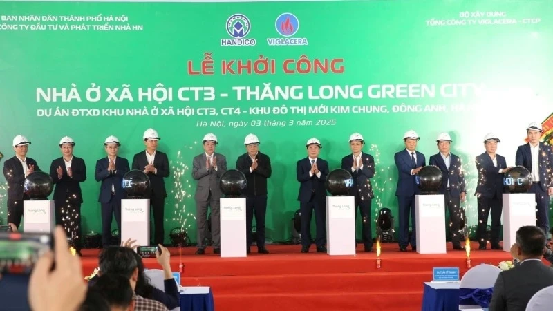 Delegates attend the groundbreaking ceremony of the project.