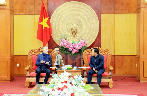 At the working session (Photo: VNA)