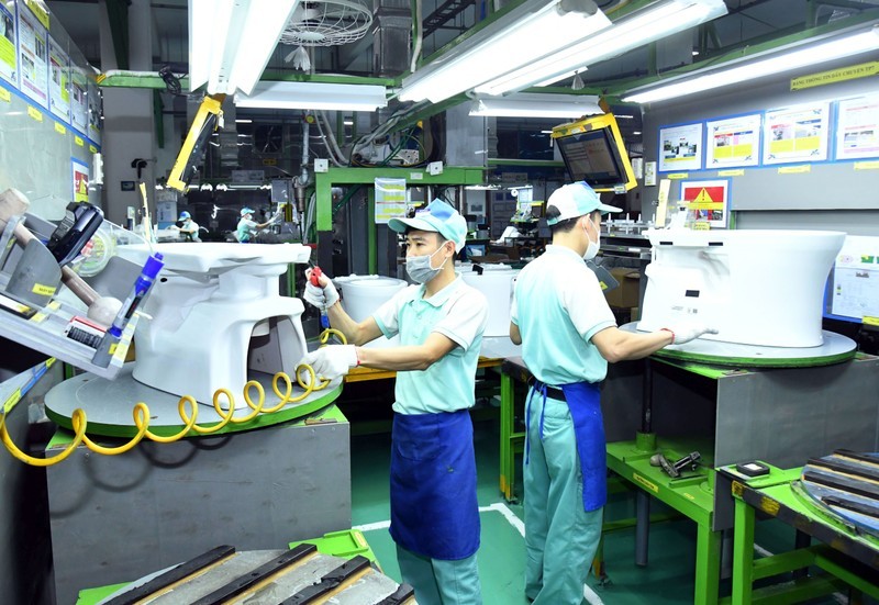 Manufacturing restroom equipment at Toto Vietnam. (Photo: Minh Ha)