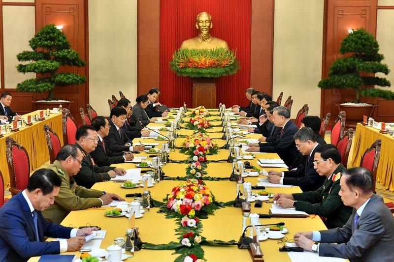 The high-level meeting between the Communist Party of Vietnam and the Lao People’s Revolutionary Party. (Photo: NDO/Dang Khoa)