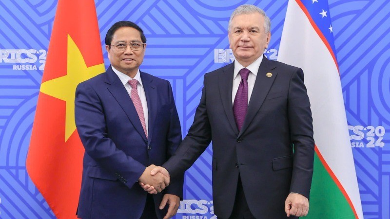 PM Pham Minh Chinh and Uzbekistan’s President Shavkat Mirziyoyev. (Photo: VGP)