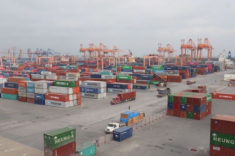 Loading and unloading goods at Hai Phong Port.